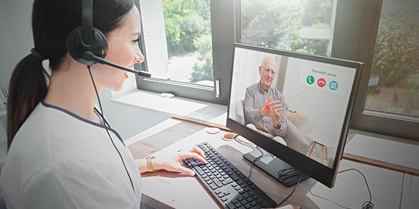 Telehealth nurse answering a call from a patient